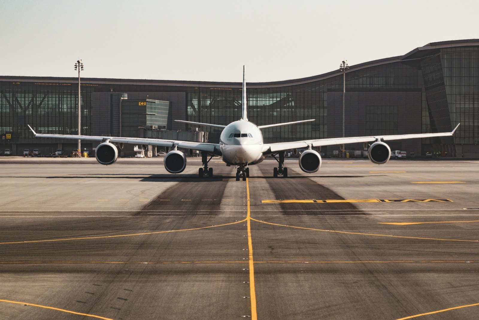 Wide-body freighter on airport tarmac at dawn